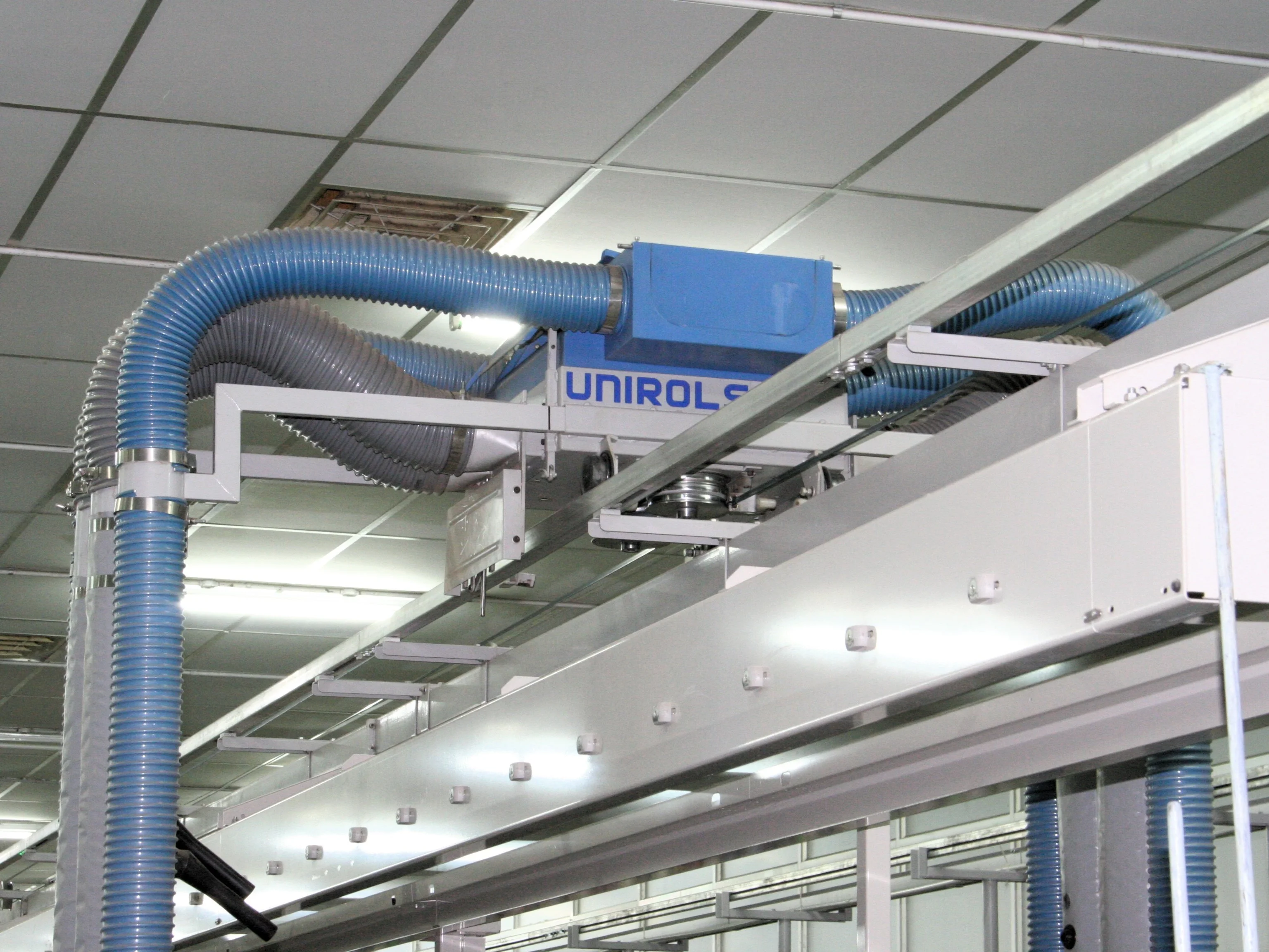 Overhead travelling cleaner - for spinning units - Belt driven travelling cleaner